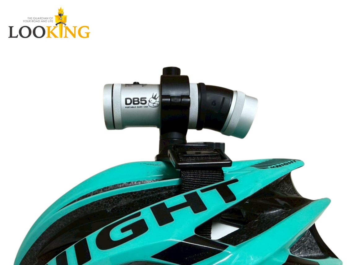 Bicycle helmet attached strap camera